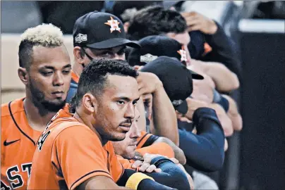  ?? GREGORY BULL/AP ?? Carlos Correa, foreground, and the Astros nearly overcame a 3-0 deficit in the ALCS before falling to the Rays.