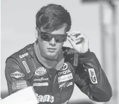  ?? JEROME MIRON, USA TODAY SPORTS ?? NASCAR team owner Joe Gibbs says of Camping World Truck Series leader Erik Jones, above, “He’s got a fire about him.”