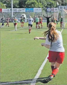  ?? KENN OLIVER/THE TELEGRAM ?? The Memorial University Sea-Hawks’ Anna Aucoin sends a corner kick into the box during a training session earlier this season. Head coach Mike Power has been impressed with the play of Aucoin and fellow rookies Stacey Hanlon, Sydney Hector and Jenny...