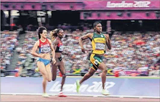  ??  ?? Running on testostero­ne? Caster Semenya leads Elena Arzhakova of Russia and Janeth Jepkosgei Busienei of Kenya in the women’s 800m semifinals at the London 2012 Olympics. Photo: Cameron Spencer/Getty Images