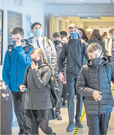  ??  ?? GUIDANCE: Secondary pupils of all ages in Dundee schools are being urged to wear face coverings in the classroom, as well as all communal areas, from today.