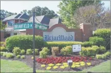  ??  ?? The entrance to the
Briarwood subdivisio­n, lat Briarfield
Lane and Kirby-Whitten
Parkway in Bartlett, received the Bartlett City Beautiful Civic Pride Award
for May.