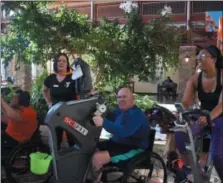  ?? MARIAN DENNIS — MEDIANEWS GROUP ?? The Spring Valley YMCA set up a group of cycling machines in its lobby Wednesday to help raise funds for their annual campaign. Visitors were encouraged to sign up for a duration on the bikes and help bolster donations.