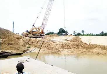  ??  ?? A crane at work in Bayelsa.