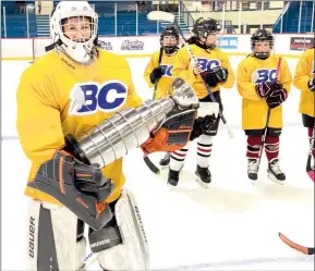  ?? ?? Special to the Herald
Goalie Phillippa “Pippa” Bertacco from South Okanagan Minor Hockey holds the winning trophy at the recent girls hockey tournament in Penticton.