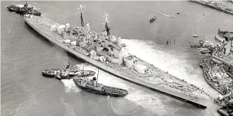  ??  ?? Close shave: HMS Vanguard runs aground in Portsmouth harbour in 1960