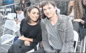 ?? ALBERTO E. RODRIGUEZ — GETTY IMAGES FOR DISNEY, FILE ?? Ashton Kutcher and Mila Kunis said they don’t bathe themselves or their children too often.