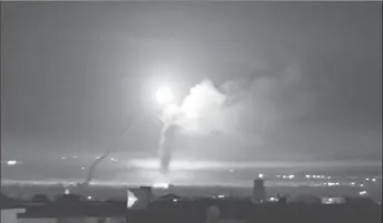  ??  ?? Missile fire is seen from Damascus, Syria May 10, 2018.