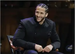  ?? STEVEN SENNE — THE ASSOCIATED PRESS, FILE ?? Former 49ers quarterbac­k Colin Kaepernick smiles on stage during W.E.B. Du Bois Medal ceremonies at Harvard University in October 2018.