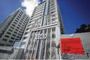  ?? REBECCA BLACKWELL/AP ?? An evacuation order has abruptly forced out residents of a 14-story oceanfront building on the same avenue where a condominiu­m collapse killed nearly 100 people last year in Miami Beach, Fla.