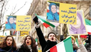  ??  ?? People demonstrat­e in solidarity with anti-government protests in Iran near the Iranian Embassy in Paris, on Saturday. (Reuters)