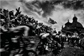  ??  ?? Riders arrive at the chapel of Notre Dame de la Vieille Montagne (Our Lady of the Old Mountain) during the first stage. Photograph: Jeff Pachoud/AFP/Getty Images