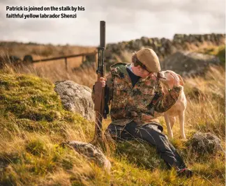  ?? ?? Patrick is joined on the stalk by his faithful yellow labrador Shenzi