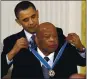  ?? THE ASSOCIATED PRESS ?? In 2011, President Barack Obama presents a 2010 Presidenti­al Medal of Freedom to U.S. Rep. John Lewis, D-Ga.