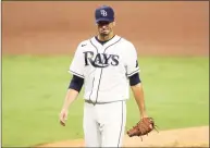  ?? Sean M. Haffey / Getty Images ?? Rays pitcher Charlie Morton reacts as he walks off the field after being pulled during the sixth inning against the Houston Astros in Game 7 of the ALCS at PETCO Park on Saturday.