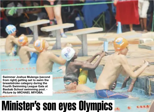  ??  ?? Swimmer Joshua Mulenga (second from right) getting set to swim the breaststro­ke category during the Fourth Swimming League Gala at Baobab School swimming pool. -