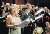  ??  ?? SOPRANO SUMMER HASSAN sings with the Pasadena Symphony at the Ambassador Auditorium.