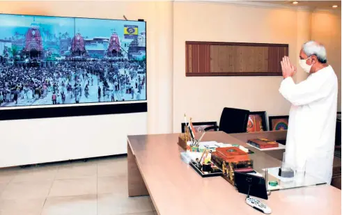  ??  ?? CHIEF MINISTER NAVEEN PATNAIK watching the rath yatra at his office in Bhubaneswa­r on June 23. The BJP claimed to have played a major role in facilitati­ng the conduct of the festival.