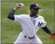  ?? KATHY WILLENS - THE ASSOCIATED PRESS ?? New York Yankees starting pitcher Domingo Germán delivers during the first inning of Sunday’s game against the Toronto Blue Jays in New York.