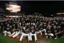  ?? Photograph: Orlando Ramirez/ USA Today Sports ?? The San Diego Padres pose for a photo after defeating the Los Angeles Dodgers in the NLDS.