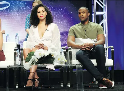  ?? — AP ?? Madeleine Mantock, left, who stars with Ser’Darius Blain in the Charmed reboot, says the script is ‘fantastic.’