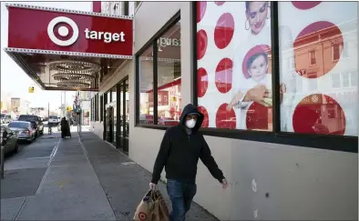  ?? MARK LENNIHAN — THE ASSOCIATED PRESS FILE ?? Online sales at Target more than doubled as the pandemic put millions in lockdown during the first quarter, revealing further the critical role big box stores played in getting supplies to an immobilize­d population.