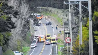  ??  ?? Emergency services at the scene of the crash on State Highway 2, which killed Steven Hart in September 2018.