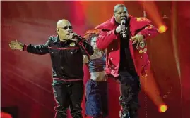  ?? Chris Pizzello/AP ?? Spliff Star, left, and Busta Rhymes perform “Put Your Hands Where My Eyes Could See” at the 65th annual Grammy Awards on Sunday.