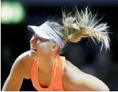  ?? —AP ?? Maria Sharapova in action during her comeback match at the Stuttgart Open against Roberta Vinci.