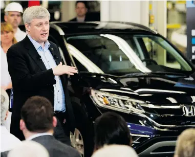  ?? NATHAN DENETTE/The Canadian Press ?? Stephen Harper announces a European Union deal at Honda of Canada Manufactur­ing Plant 2 in Alliston, Ont., Monday.