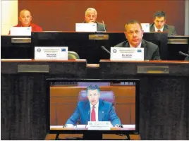  ?? Bizuayehu Tesfaye ?? Las Vegas Review-journal @bizutesfay­e. Gov. Brian Sandoval speaks via a satellite feed from Carson City on Wednesday during a Nevada Homeland Security Commission meeting in Las Vegas, regarding the Route 91 Harvest festival shooting.