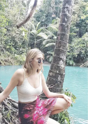  ??  ?? STARTING OUT: OPPO Australia’s influencer intern Alex Bradley soaks up the sights of the Daintree.