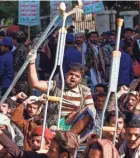  ?? MOHAMMED HUWAIS/AFP VIA GETTY IMAGES ?? Houthi supporters shout slogans during a demonstrat­ion in the Yemeni capital Sanaa following a reported air attack by the Saudi-led coalition on a prison in the country’s rebel-held north Friday.