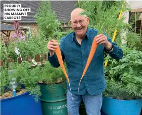  ?? ?? PROUDLY SHOWING OFF HIS MASSIVE CARROTS
