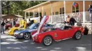  ?? SUBMITTED PHOTO - CARL HESS ?? Chris Moore’s bright red 1981 Shelby Cobra sparkles like a jewel in the late September sun.