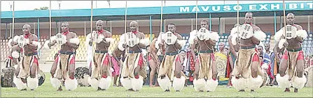  ?? (Pics: Nimrod Hlophe) ?? Mbelebelen­i Sibhaca team opted for a unique appearance with small shields during the Ingwenyama Cup Manzini Region Culture Competitio­n at Mavuso Sports Centre yesterday.