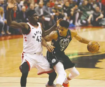  ?? JACK BOLAND ?? Pascal Siakam, who has emerged as Toronto’s franchise player, will go head to head against Bucks superstar Giannis Antetokoun­mpo when the two renew hostilitie­s on Saturday night in Milwaukee.