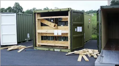  ?? U.S. ARMY CRIMINAL INVESTIGAT­ION COMMAND — VIA THE ASSOCIATED PRESS ?? A storage container of explosive ordnance shows signs of theft July 13, 2017, after arriving at the Letterkenn­y Army Depot in Chambersbu­rg, Pa. An ammunition canister containing 32rounds of 40mm M430A1gren­ades, property of the U.S. Marine Corps, was missing.