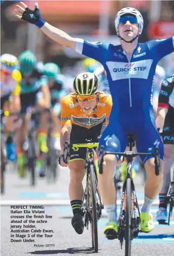  ?? Picture: GETTY ?? PERFECT TIMING: Italian Elia Viviani crosses the finish line ahead of the ochre jersey holder, Australian Caleb Ewan, in Stage 3 of the Tour Down Under.