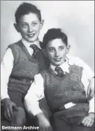  ?? ?? Bettmann Archive WUNDERKIND: Henry Kissinger at 11 (top) sits with brother Walter, 10.