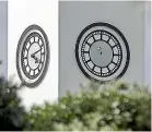  ??  ?? The hands from one of the Palmerston North clock tower faces were removed for repairs.