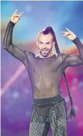  ??  ?? HAIR APPARENT: Slavko Kalezic from Montenegro performs with the song ‘Space’ during rehearsals at the Internatio­nal Exhibition Centre in Kiev, Ukraine.