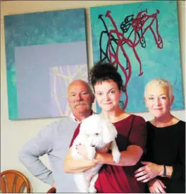  ??  ?? Andrew Manson, Sarah Eva Manson and Attracta Manson of the Ballyrogan collective with their dog Mouse.