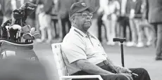  ?? MICHAEL MADRID/USA TODAY SPORTS ?? Honorary starter Lee Elder is seated at the first tee during the first round of The Masters on Thursday.