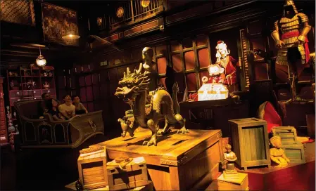  ?? LAM YIK FEI — GETTY IMAGES ?? Hong Kong Disneyland’s Mystic Manor is among the attraction­s around the globe tied to the Society of Adventurer­s and Explorers, a backstory element concocted to link various tales in the Disney universe, like those underlying the Jungle Cruise attraction in Anaheim and Tower of Terror in Tokyo.