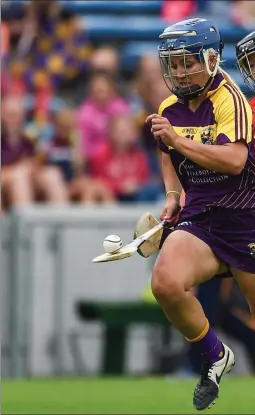  ??  ?? Wexford attacker Katrina Parrock races away from Cork full-back Laura T