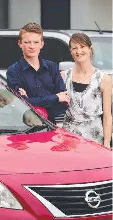  ?? Picture: SCOTT RADFORD- CHISHOLM ?? CONNED: Kate Horan and her son Nathaniel, 18, who was convinced to withdraw $ 1700 in cash by a driving instructor, who took the money.