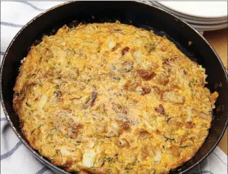  ?? The Associated Press ?? A lightened sweet zucchini and chorizo Spanish tortilla in Coronado, Calif. This dish is from a recipe by Melissa d'Arabian.