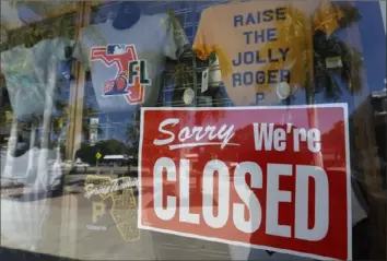  ?? Carlos Osorio ?? A closed sign is displayed in the window of the Pirates spring training gift shop on March 16, 2020, at LECOM Park in Bradenton.