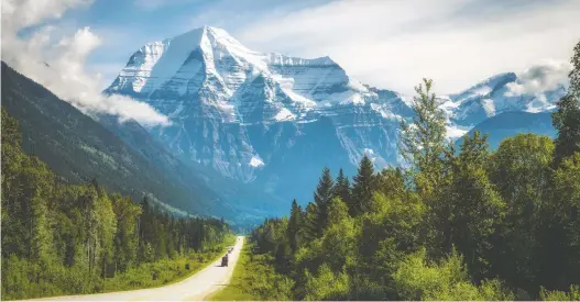 ?? GETTY IMAGES/ISTOCKPHOT­O ?? The famed Yellowhead Highway in the country's west gives visitors stunning views of Mount Robson, the highest peak in the Canadian Rockies.